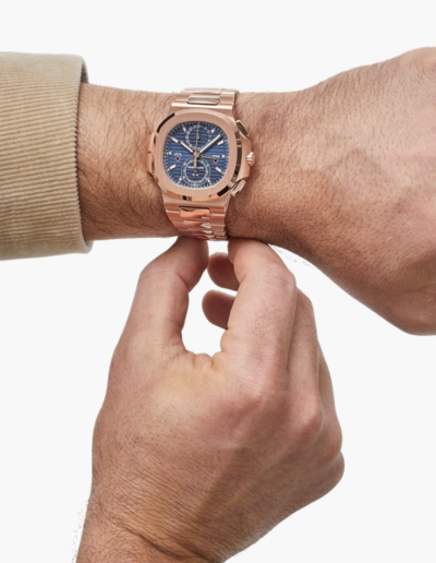Patek Philippe 40.5mm 5990/1R Travel Time Rose Gold Sunburst Blue Dial on wrist