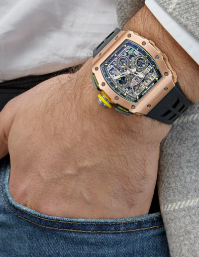 Richard Mille RM 030 rose gold skeleton automatic 50mm men's watch on wrist and hand in jeans pocket