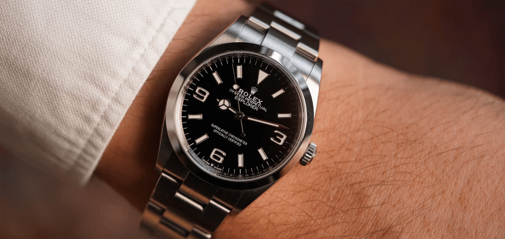 Black Rolex Oyster Perpetual watch on wrist
