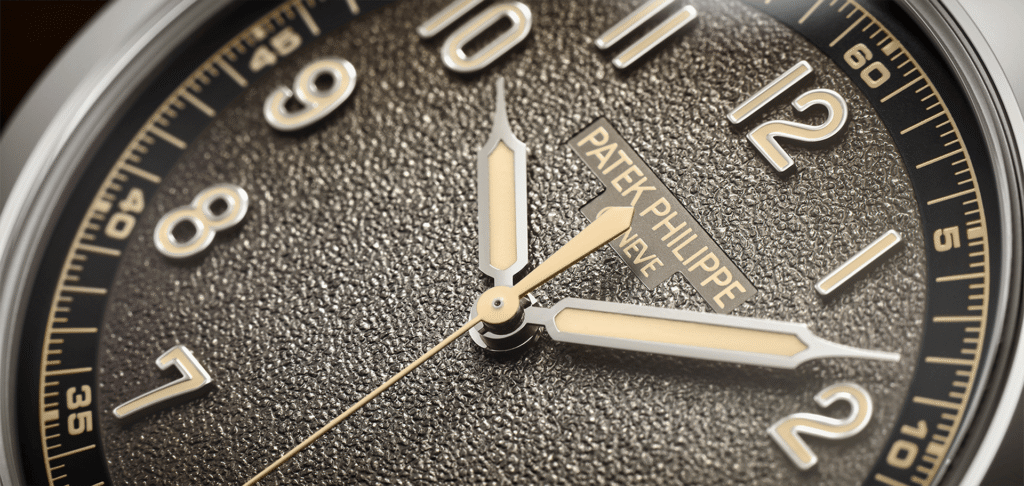 High-end luxury watch showing intricate textured dial patterns and guilloché craftsmanship