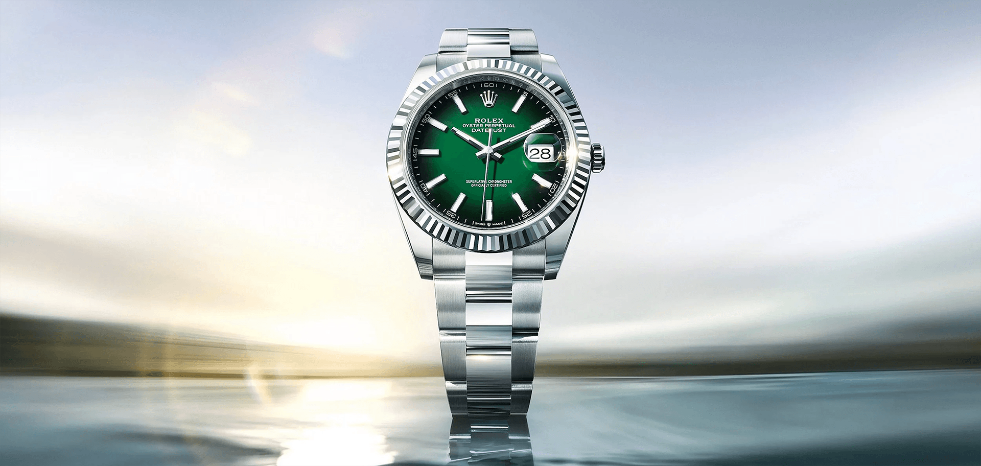 September-Blog-2,-Image-3 Luxury watch featuring a green malachite stone dial with natural mineral patterns