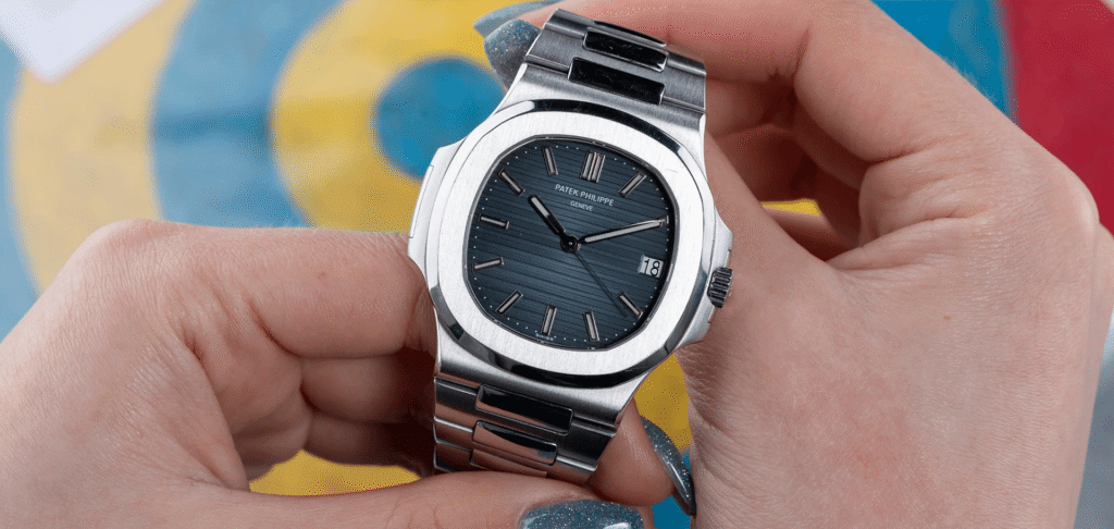 Patek Philippe Nautilus luxury watch held in hands