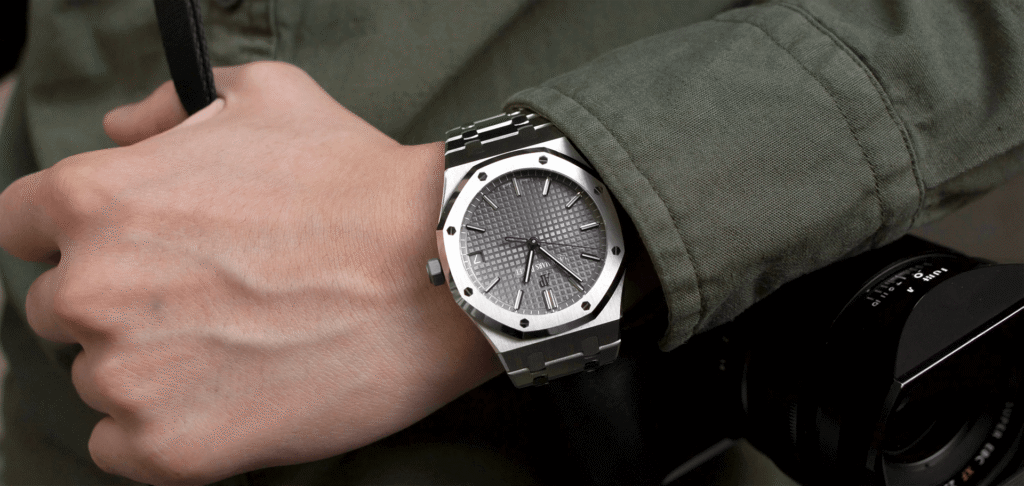 Luxury watch worn on the wrist during a watch collection review