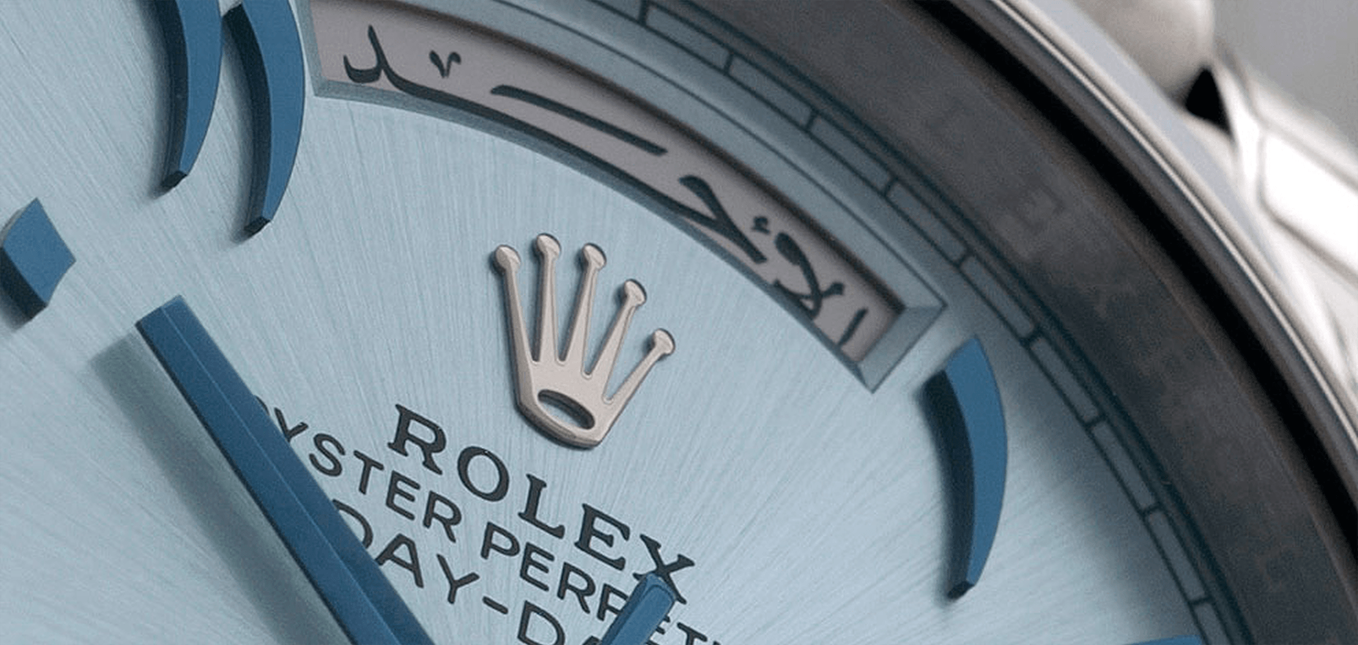 October-Blog-2,-Image-1 Close-up of a Rolex Day-Date dial with Arabic script and blue hour markers